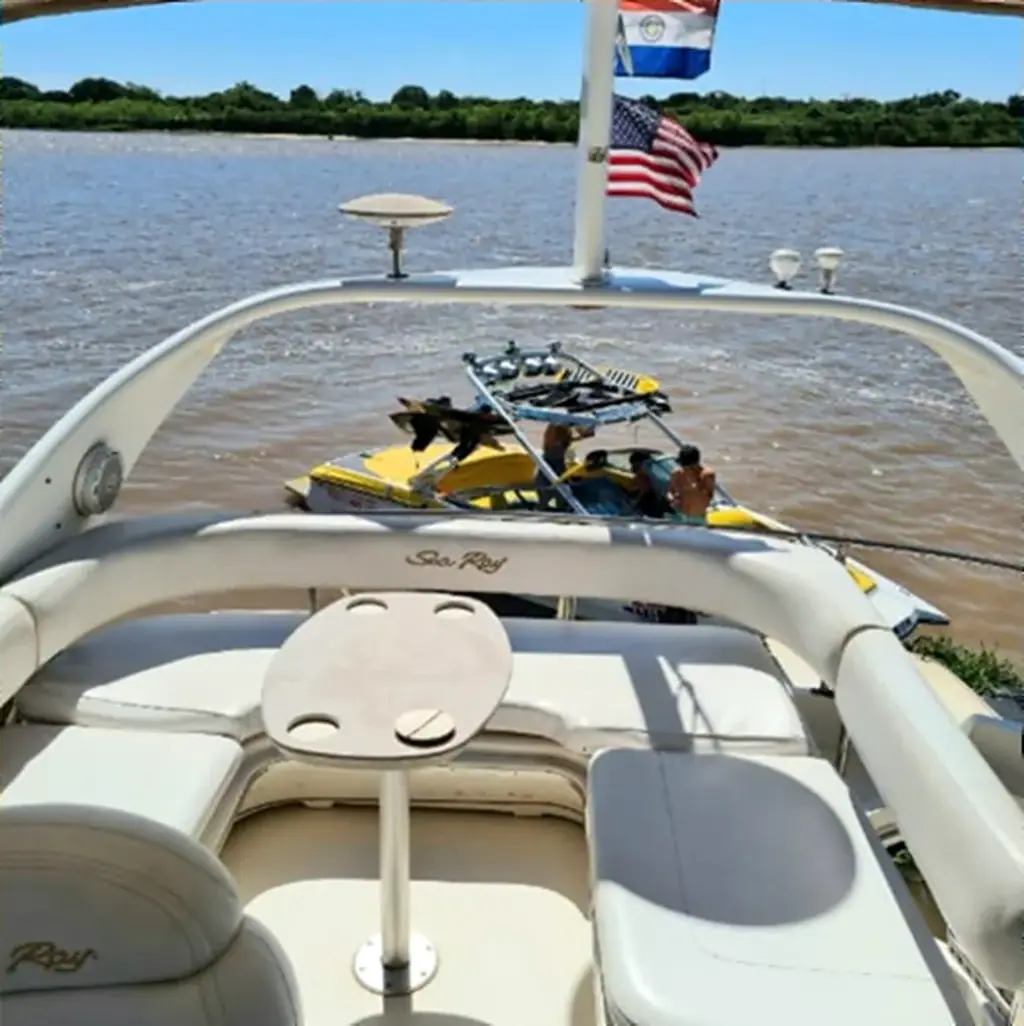 Upper deck terrace of the yacht with table and seating